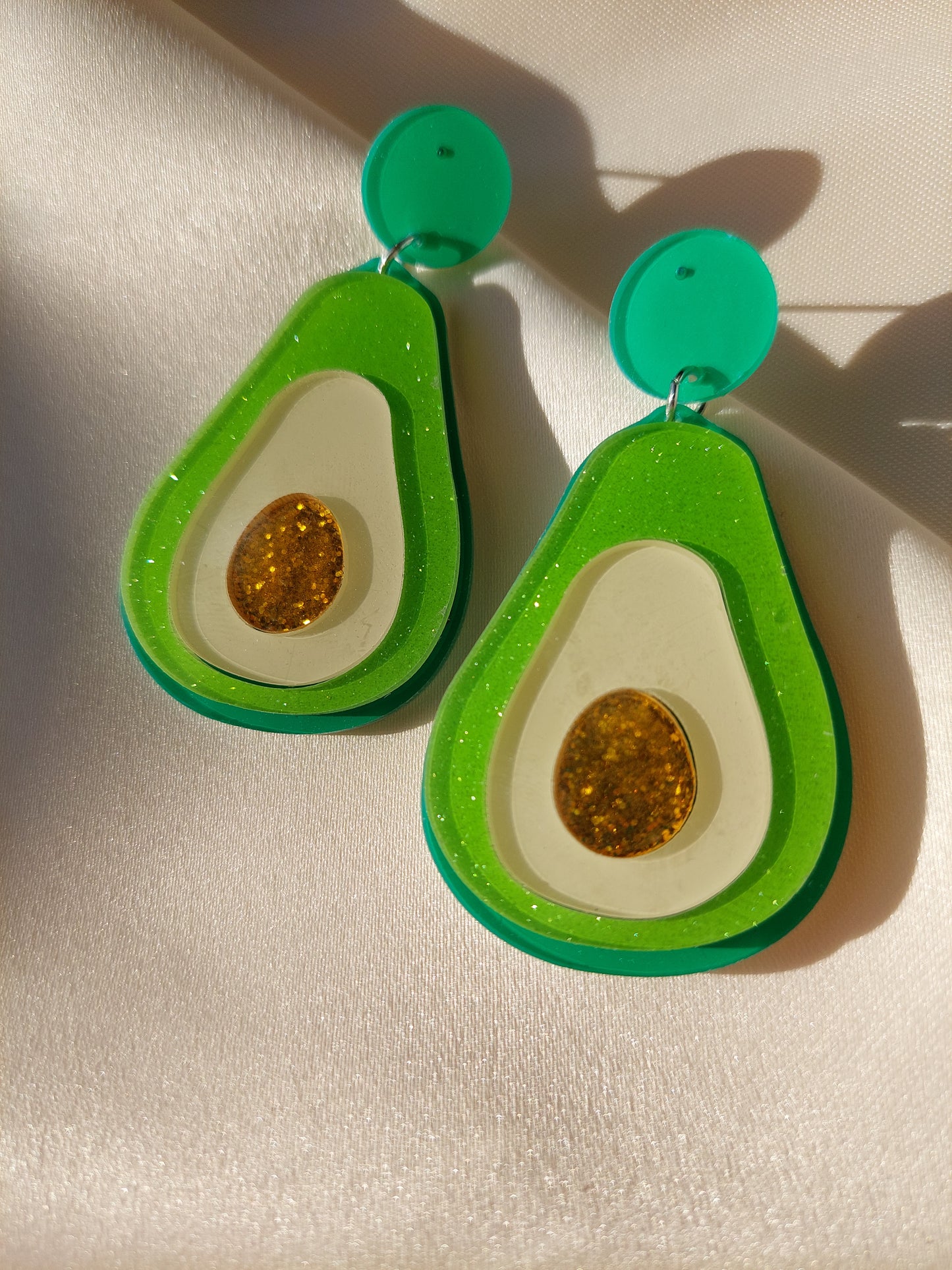 Avocado earrings. Green, yellow and gold glitter. Silver stud backings.