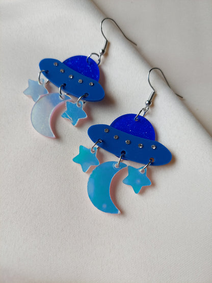 Blue iridescent space ship, moon and star earrings. Silver hooks.