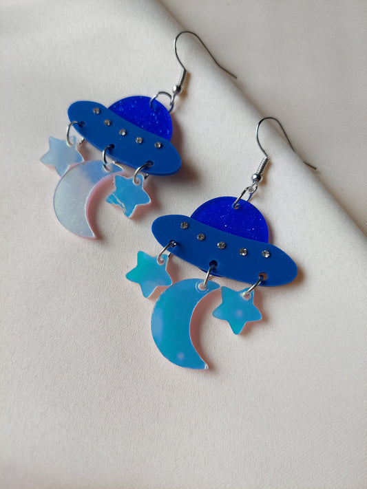Blue iridescent space ship, moon and star earrings. Silver hooks.