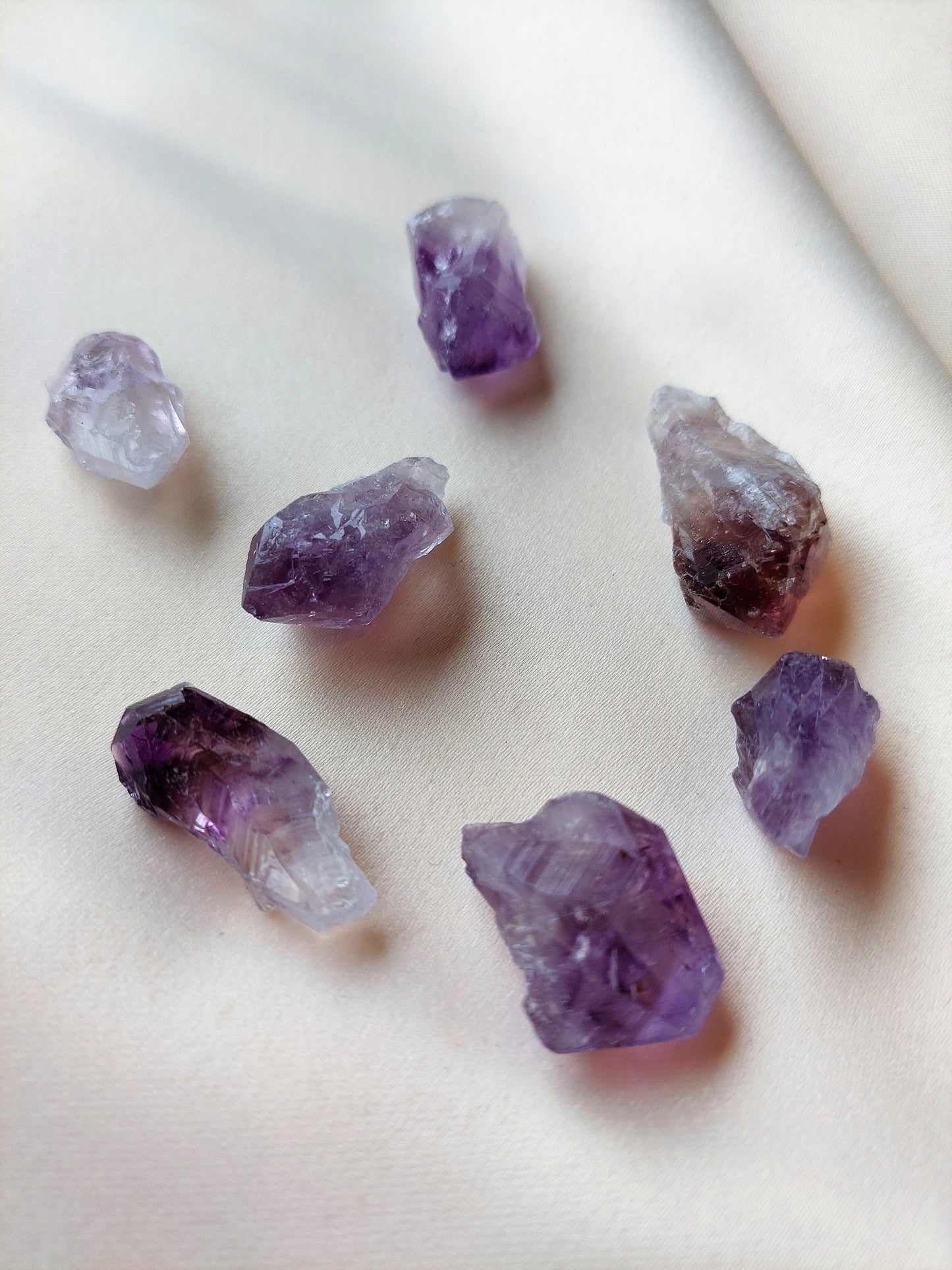 Rough amethyst crystal. Purple and clear. 