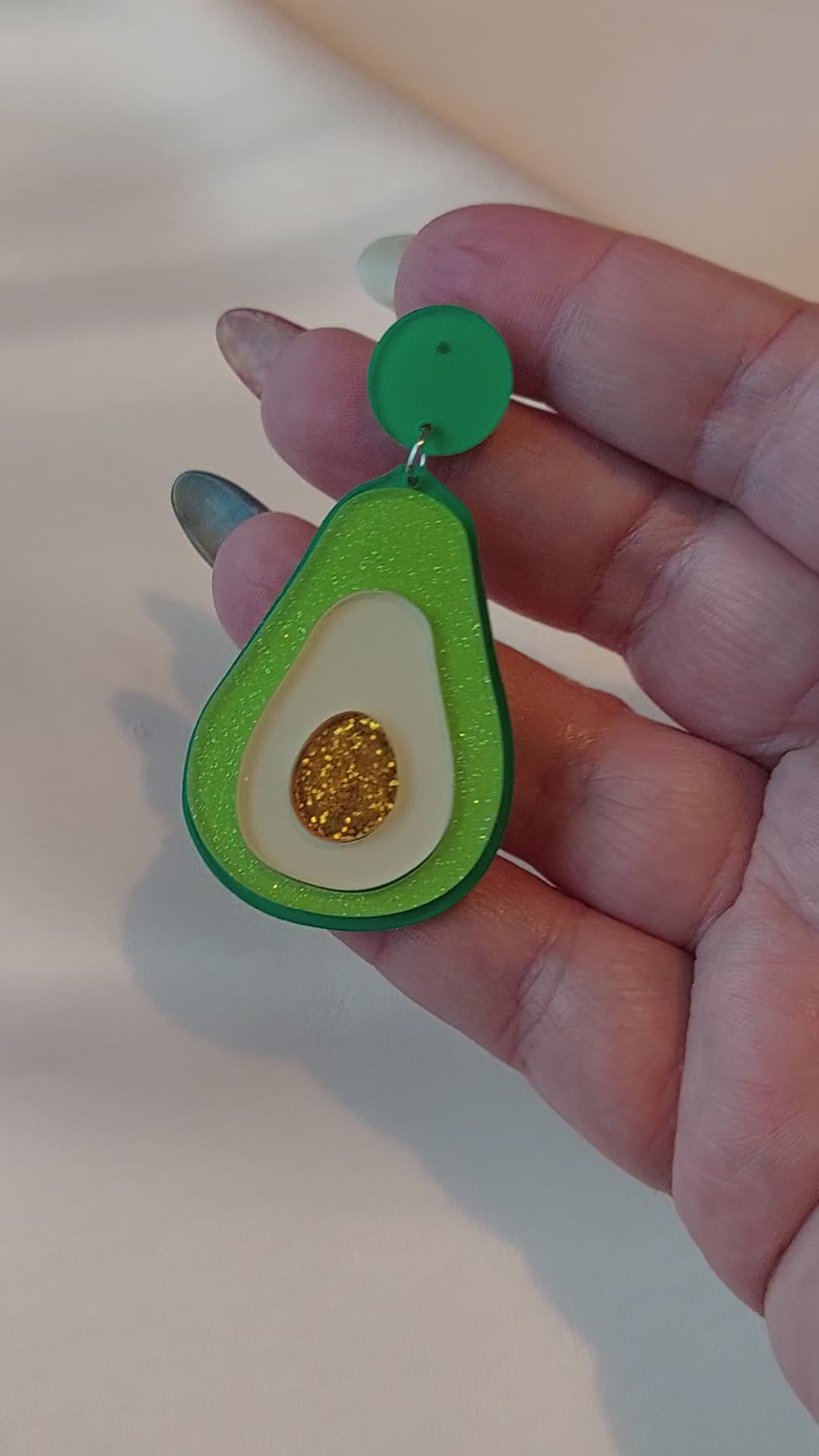 Avocado earrings. Green, yellow and gold glitter. Silver stud backings. 