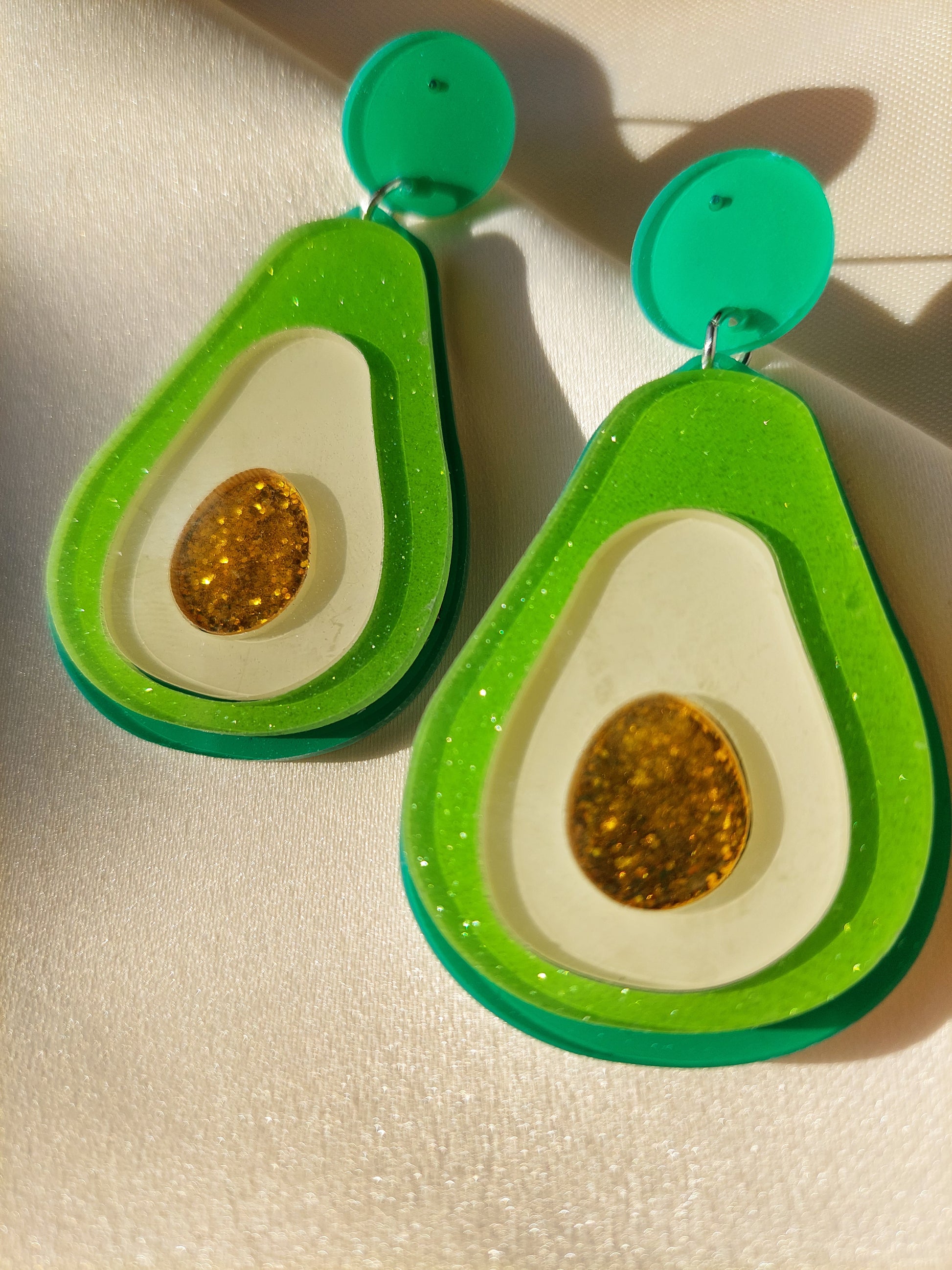 Avocado earrings. Green, yellow and gold glitter. Silver stud backings. 